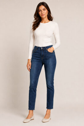 Atte Naomi Runway Blue straight leg jeans styled with a white long sleeve top.