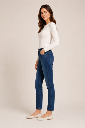 Atte Naomi Runway Blue straight leg jeans styled with a white long sleeve top.