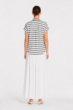 Mela Purdie Henley Tank in white and black stripes, a relaxed sleeveless women's top with a partial button placket.