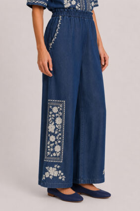 Johnny Was cropped paperbag waist pants in Randal Denim Blue with ivory embroidery.