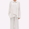Off-white relaxed fit shirt by La Vaca Loca featuring a unique diagonal front closure and chest pocket.