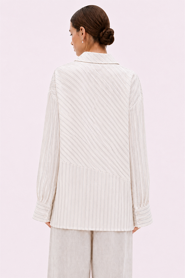 Off-white relaxed fit shirt by La Vaca Loca featuring a unique diagonal front closure and chest pocket.