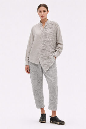 La Vaca Loca Salvd loose-fit asymmetrical shirt in cold white distressed cotton voile fabric with a stand-up collar.