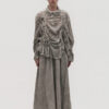 La Vaca Loca Somatico oversized long-sleeved shirt in cold black voile fabric with irregular front gathers.