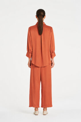 Mela Purdie Pace Pant in Copper, a luxurious mirror satin wide-leg pant for women
