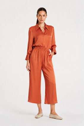 Mela Purdie Pace Pant in Copper, a luxurious mirror satin wide-leg pant for women