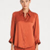 Mela Purdie Resort Blouse in Copper, an elegant mirror satin long sleeve shirt for women