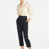 Mela Purdie Ruffle Resort Top in Vanilla, an elegant long sleeve shirt with statement ruffle detailing for women
