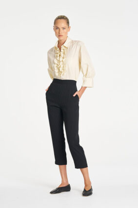 Mela Purdie Ruffle Resort Top in Vanilla, an elegant long sleeve shirt with statement ruffle detailing for women