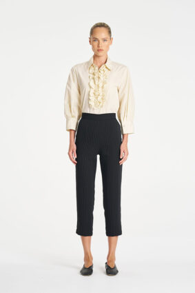 Mela Purdie Ruffle Resort Top in Vanilla, an elegant long sleeve shirt with statement ruffle detailing for women