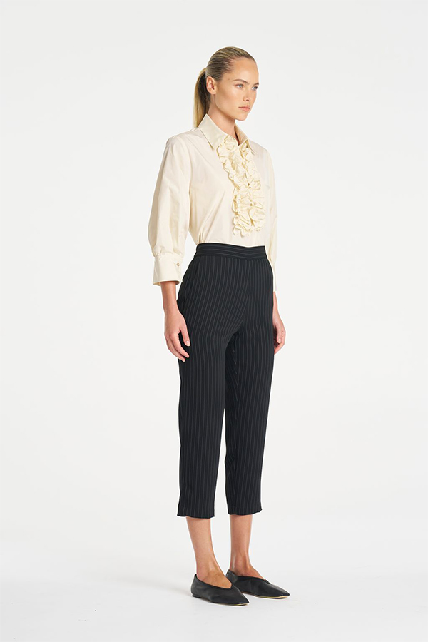 Mela Purdie Ruffle Resort Top in Vanilla, an elegant long sleeve shirt with statement ruffle detailing for women