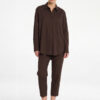Model wearing Mela Purdie Zip Tapered Pant in Fudge brown with matching blouse.