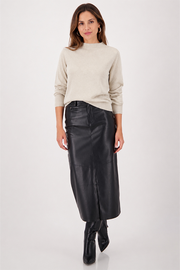 Model wearing a Monari Cut-Out Sweater in Almond beige knit with a high neckline.