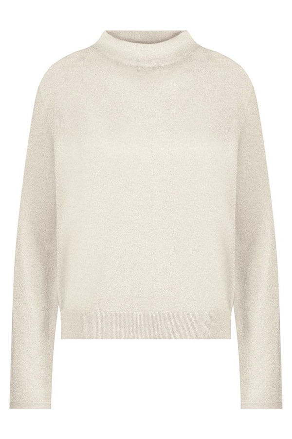 Model wearing a Monari Cut-Out Sweater in Almond beige knit with a high neckline.