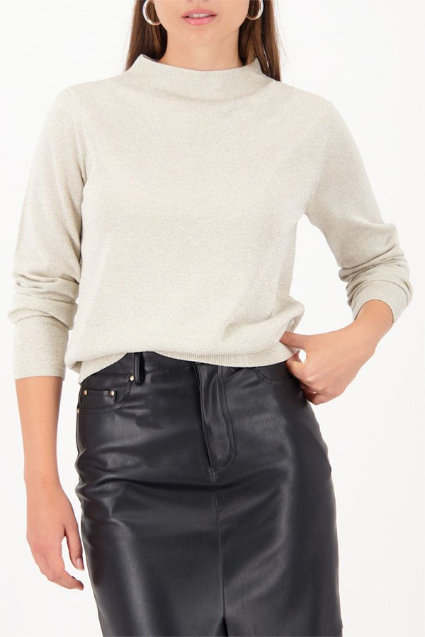 Model wearing a Monari Cut-Out Sweater in Almond beige knit with a high neckline.
