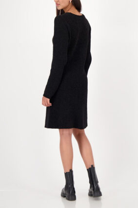 Monari knitted chenille black dress worn by a model.