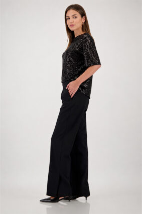 Monari Pleated Pants Black showing the wide-leg silhouette and smooth fabric.