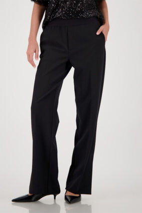 Monari Pleated Pants Black showing the wide-leg silhouette and smooth fabric.