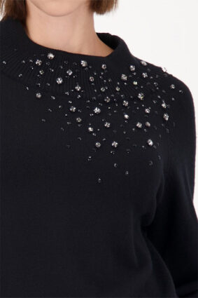 Monari black sweater with gem details worn by a model to showcase the refined silhouette.