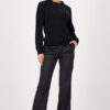 Monari black sweater with gem details worn by a model to showcase the refined silhouette.