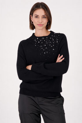 Monari black sweater with gem details worn by a model to showcase the refined silhouette.