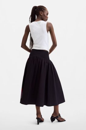 Desigual Pixelated Midi Skirt Negro front view showing fluid A-line silhouette and vibrant pixel-inspired print