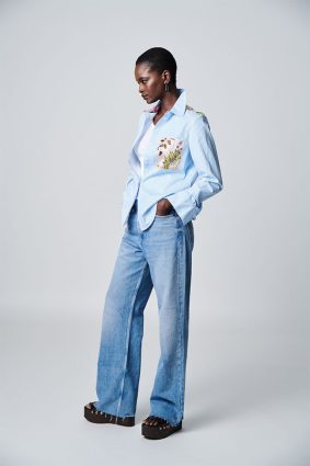 Herzens Blouse Aurora Multi striped button-through shirt with floral chest pocket and back yoke detail.Herzens Blouse Aurora Multi striped button-through shirt with floral chest pocket and back yoke detail.