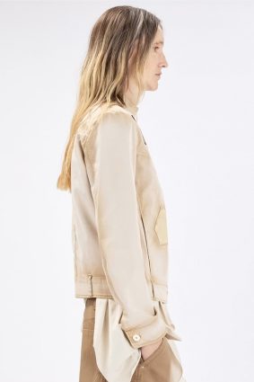 High Onset Short Jacket in a cotton-elastane blend showcasing trouser-inspired hem details with belt loops.