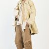 High Onset Short Jacket in a cotton-elastane blend showcasing trouser-inspired hem details with belt loops.
