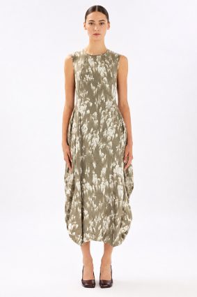 Model wearing the black-and-white printed High Tech At Length Dress, featuring a sleeveless, at-length silhouette