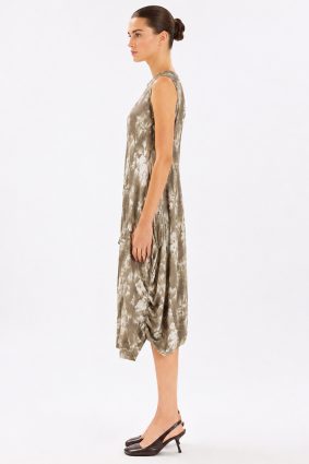 Model wearing the black-and-white printed High Tech At Length Dress, featuring a sleeveless, at-length silhouette