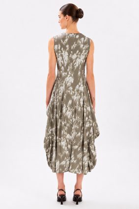 Model wearing the black-and-white printed High Tech At Length Dress, featuring a sleeveless, at-length silhouette