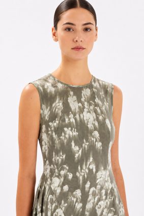 Model wearing the black-and-white printed High Tech At Length Dress, featuring a sleeveless, at-length silhouette