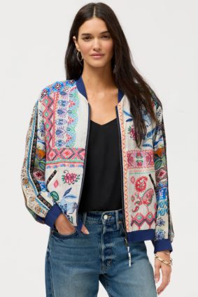 Johnny Was Kim Bomber Jacket Armeria, a luxurious reversible bomber jacket featuring vibrant patchwork-inspired prints, contrasting ribbed trims, and rich jewel-toned floral details.