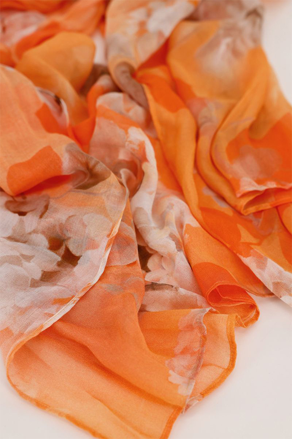 Monari floral print scarf in orange, coral, and blush tones, lightweight viscose fabric