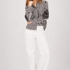 Monari all over print sweater in dark chocolate stripe worn by model