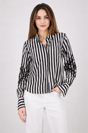 Monari all over print sweater in dark chocolate stripe worn by model