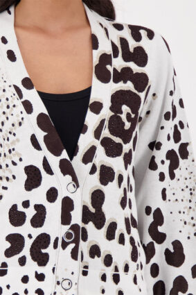 Monari jacket in a dark chocolate leopard jacquard print pattern worn by a model.