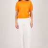 Monari off white jeggins pants with a sleek fitted silhouette worn by a model.