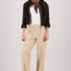 Monari sand-colored leopard print leglet scarf featuring a bold feline motif worn by a model.