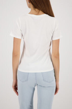 Monari off-white short sleeve t-shirt with a clean silhouette worn by a model.