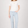 Monari off-white short sleeve t-shirt with a clean silhouette worn by a model.
