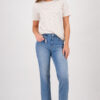 Monari soft beige short sleeve t-shirt with a flattering silhouette worn by a model.