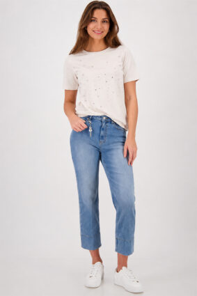 Monari soft beige short sleeve t-shirt with a flattering silhouette worn by a model.
