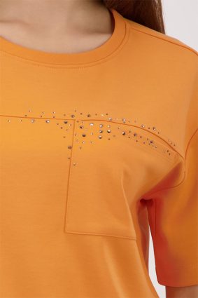 Monari jersey top in warm aperitif orange featuring crystal embellishments and patch pocket detail