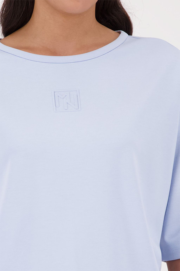 Monari light sky blue jersey top with a relaxed fit and short sleeves worn by a model