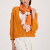 Monari gradient scarf in warm aperitif orange and blush tones, lightweight ombré design viscose fabric