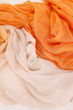 Monari gradient scarf in warm aperitif orange and blush tones, lightweight ombré design viscose fabric
