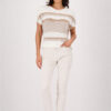 Monari textured mixed sweater in soft beige, cream, and warm camel tones worn by a model.