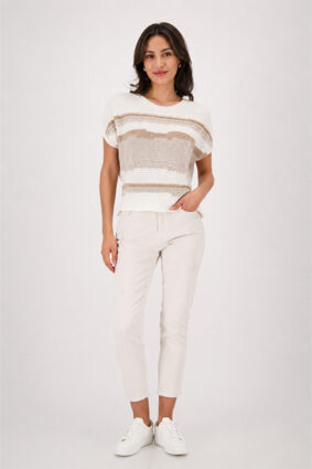 Monari textured mixed sweater in soft beige, cream, and warm camel tones worn by a model.